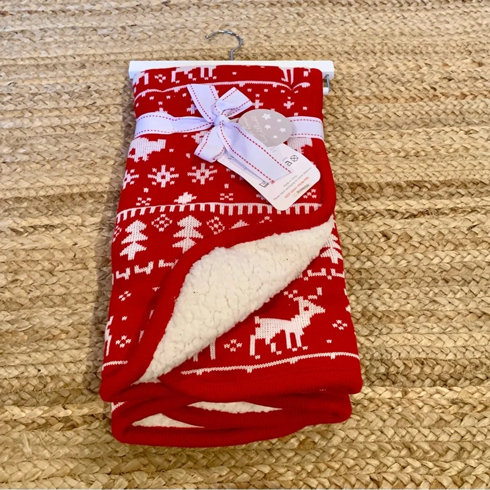 Red Holiday Blanket with White Reindeer Pattern kids
